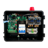 Open electrical control box showing circuit boards, relays, wiring, and a red warning beacon.