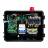 Open electrical control box showing circuit boards, relays, wiring, and a red warning beacon.