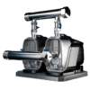 Two shiny industrial pumps connected by stainless-steel pipes with blue valve levers on a gray base (close-up).